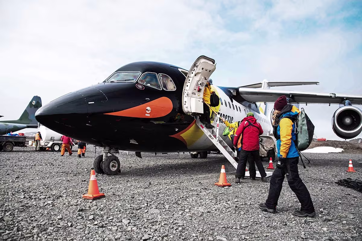 Aircraft used for an Antarctica fly cruise crossing toward King George Island